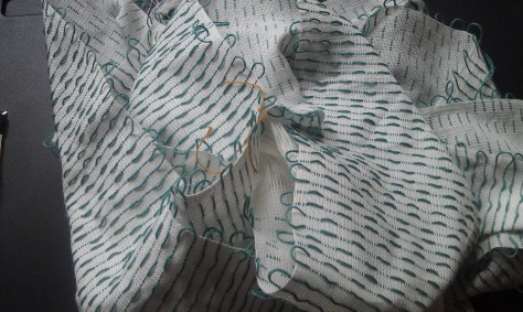 Warp completed, weaving off the loom.