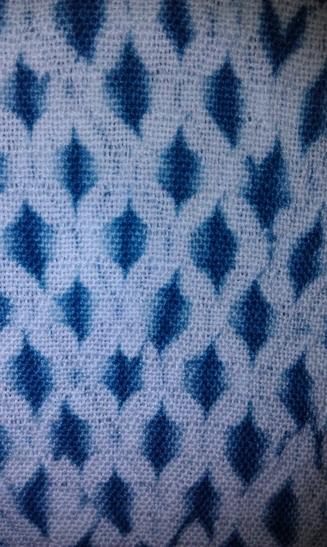 Beautiful, one-of-a-kind woven shibori scarves.