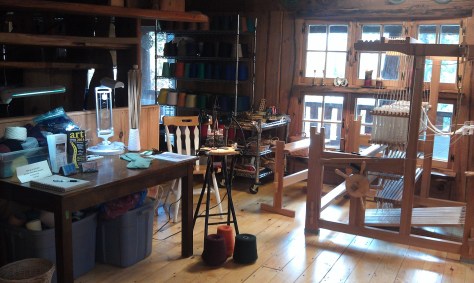 Sock machine also ready for demo as was woven shibori on loom at right.