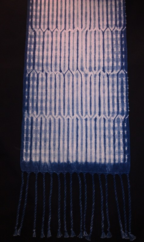 Vertical stripes scarf detail.