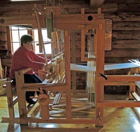At the drawloom.  Photo by Nancy Camden.