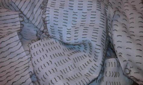 Three scarves+ off the loom.