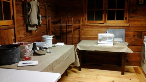 Tables, indigo vat, and supplies now inside!