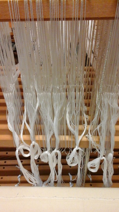 Threading the new 16/2 cotton warp.