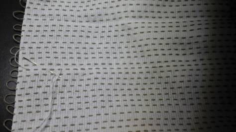 Woven shibori, fresh off the loom.